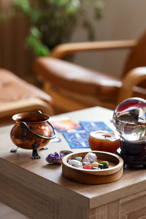 Magic attributes of clairvoyant on table