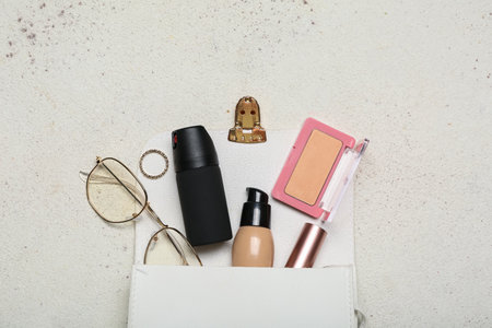 Bag with pepper spray and accessories on light backgroundの写真素材
