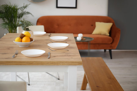 Table set in modern stylish dining roomの写真素材