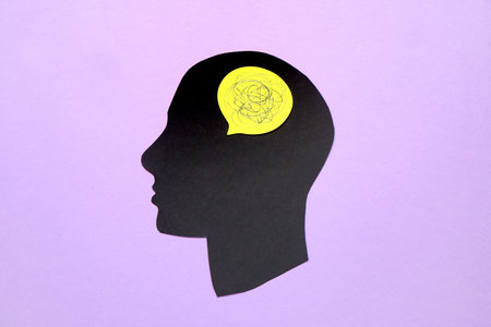 human head on color background. concept of dementiaの写真素材