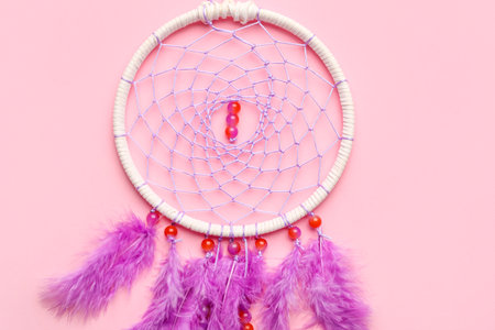 Beautiful dream catcher on pink backgroundの写真素材