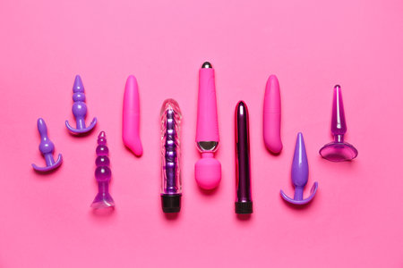 Vibrators with anal plugs on pink backgroundの写真素材
