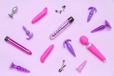 Different sex toys on lilac backgroundの写真素材