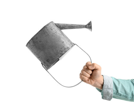 Gardener with watering can on white backgroundの写真素材