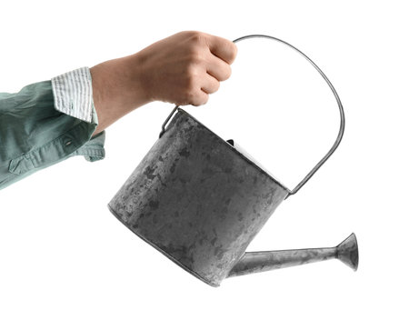 Gardener with watering can on white backgroundの写真素材