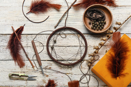 Materials for making dream catcher on white wooden backgroundの写真素材