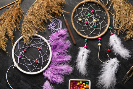 Materials for making dream catchers on dark backgroundの写真素材