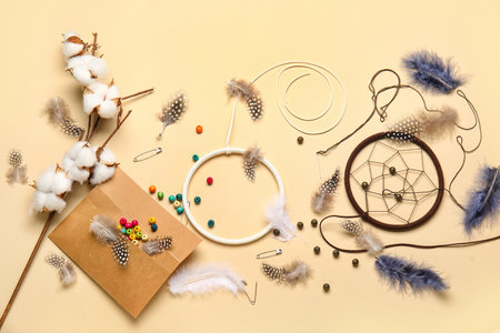 Materials for making dream catcher on beige backgroundの写真素材