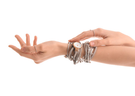 Woman with stylish wristwatches on white backgroundの写真素材
