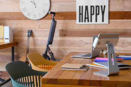 Comfortable workplace with modern computers in officeの写真素材