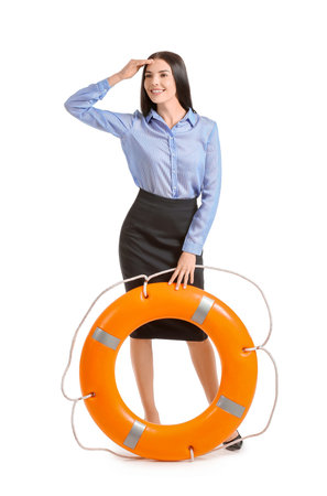 Young businesswoman with lifebuoy on white backgroundの写真素材