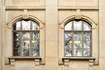 View of beautiful building with wooden windowsの写真素材