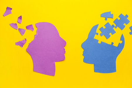 Human heads on color background. concept of dementiaの写真素材