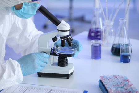 Scientist working with sample in laboratoryの写真素材