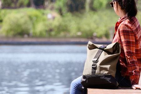 Female traveler with backpackの写真素材