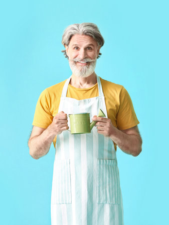 senior gardener on color backgroundの写真素材