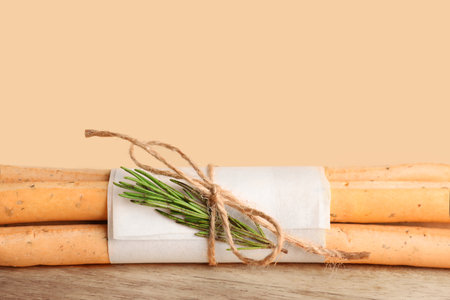 Bunch of tasty Italian Grissini on yellow background, closeupの写真素材