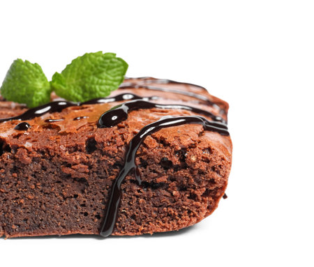 Piece of tasty chocolate brownie isolated on white background, closeupの写真素材