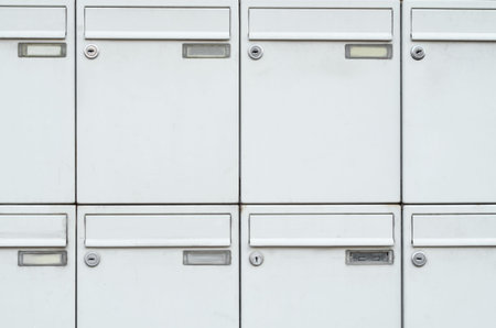 View of white mailboxes outdoors, closeup