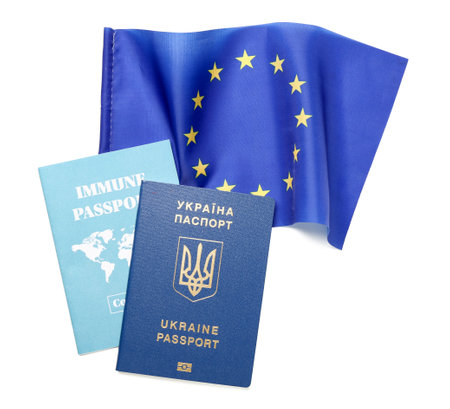 Ukrainian and immune passports with flag of European Union on white backgroundの写真素材