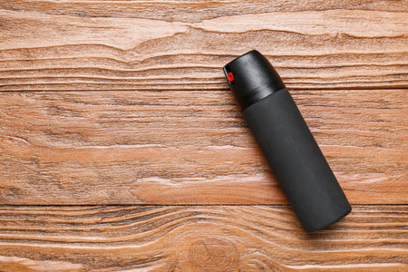Pepper spray on wooden backgroundの写真素材