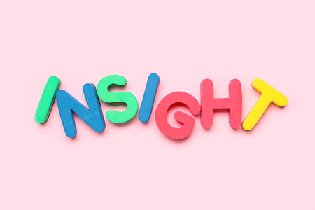 Word INSIGHT on pink backgroundの写真素材