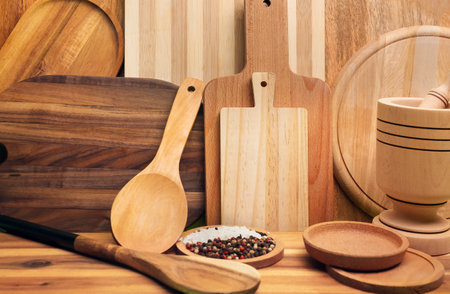 Set of kitchen supplies with wooden cutting boards and spices, closeupの写真素材
