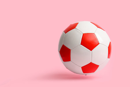 soccer ball on pink backgroundの写真素材