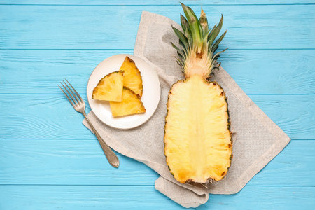 fresh cut pineapple on blue backgroundの写真素材