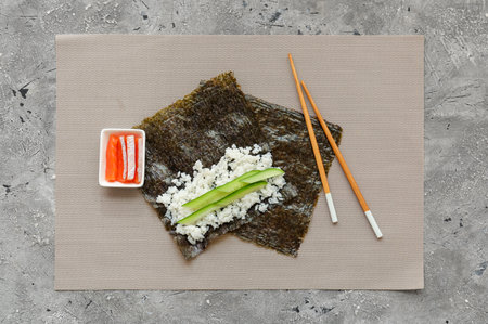 Nori and ingredients for preparing sushi rolls on grunge backgroundの写真素材