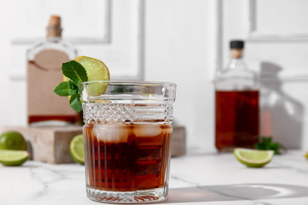 Glass of cold rum on tableの写真素材