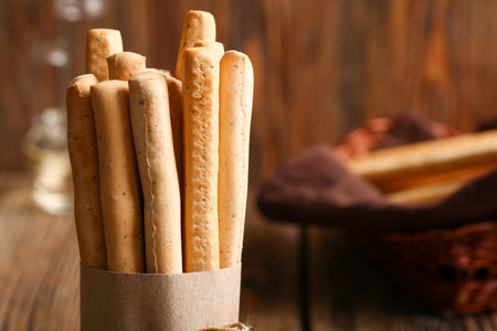 Bunch of tasty Italian Grissini on wooden background, closeupの写真素材