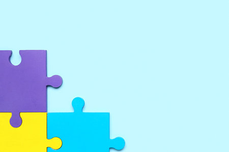 Puzzle pieces on blue background. World Autism Awareness Dayの写真素材