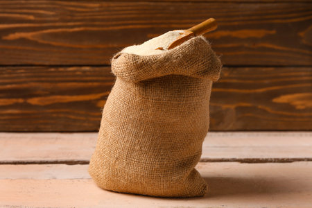 Sack bag with raw semolina on tableの写真素材