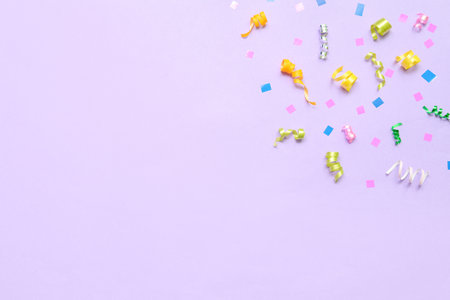 Colorful on confetti on lilac backgroundの写真素材