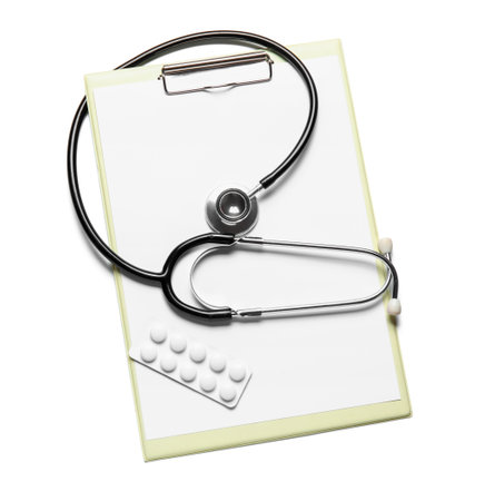 Stethoscope, clipboard and pills on white backgroundの写真素材