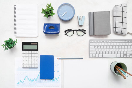 Composition with documents, eyeglasses and stationery on white backgroundの写真素材