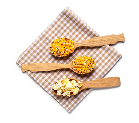 Wooden spoons with corn and napkin on white background. Festa Junina (June Festival) celebrationの写真素材