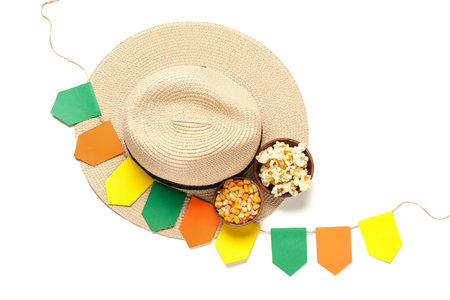 Bowls of corn with straw hat and flags on white background. Festa Junina (June Festival) celebration