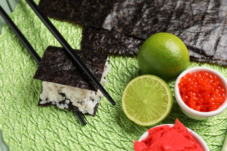 Nori with rice, caviar and lime on table, closeupの写真素材