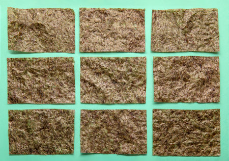 Composition with nori sheets on color background, closeupの写真素材