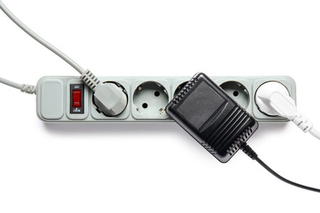 Electric extension cord with plugs isolated on white background