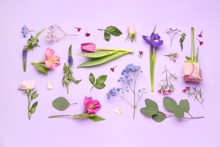 Beautiful flowers on lilac backgroundの写真素材