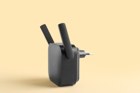 Black WiFi repeater on gray backgroundの写真素材