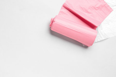 Different rolls of garbage bags on gray backgroundの写真素材