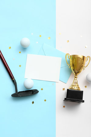 Blank card with gold cup, golf club and balls on color backgroundの写真素材