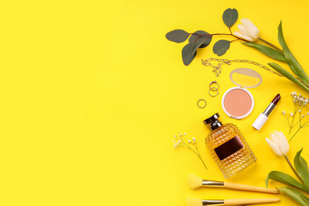 Female accessories with tulips on yellow backgroundの写真素材