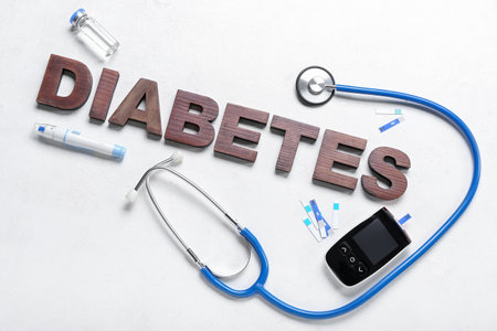 Word DIABETES with medical supplies on white backgroundの写真素材