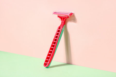 Safety razor for hair removal on color backgroundの写真素材