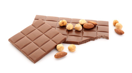 Tasty chocolate and nuts on white backgroundの写真素材